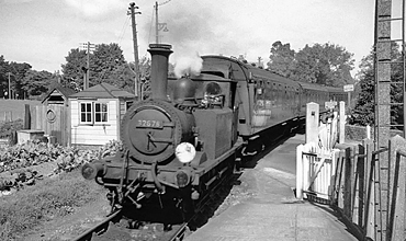 Photo of A1X 0-6-0 tank loco 32678  at Langstone Station on 9th September 1962 on a Havant to Hayling Island train