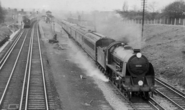 Photo of King Arthur Class 4-6-0 30451 on an up Salisbury train at New Malden on 23rd April 1962
