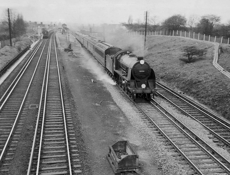 Photo of King Arthur Class 4-6-0 30451 on an up Salisbury train at New Malden on 23rd April 1962