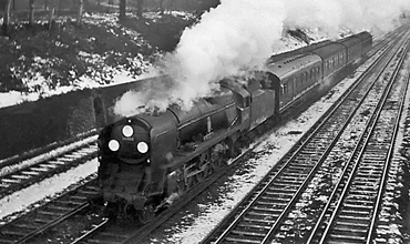 Photo of Bulleid Battle of Britain Class pacific number 34088, 213 Squadron, between South and East Croydon with a Brighton to London train, most likely the 07.35 ex Brighton, (via Oxted at 09.11), probably in winter 1961/62