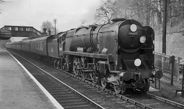 Photo of Bulleid West Country Class pacific number 34027, Taw Valley, at Woldingham with the 18.10 London to Brighton train on 26th April 1962