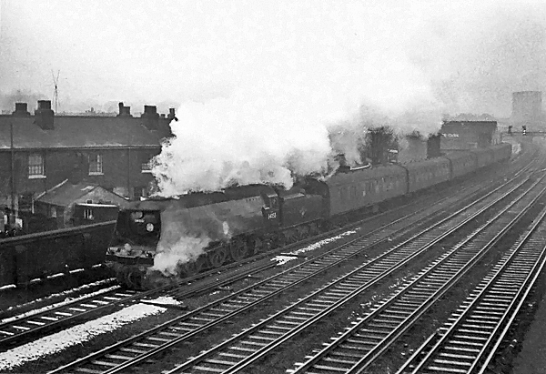Photo of Bulleid Battle of Britain Class pacific number 34055, Fighter Pilot, leaving East Croydon  station  with a Brighton to London train, most likely the 07.35 ex Brighton, (via Oxted at 09.11), probably in winter 1961/62
