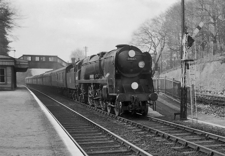 Photo of Bulleid West Country Class pacific number 34027, Taw Valley, at Woldingham with the 18.10 London to Brighton train on 26th April 1962