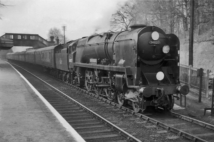 Photo of Bulleid West Country Class pacific number 34027, Taw Valley, at Woldingham with the 18.10 London to Brighton train on 26th April 1962