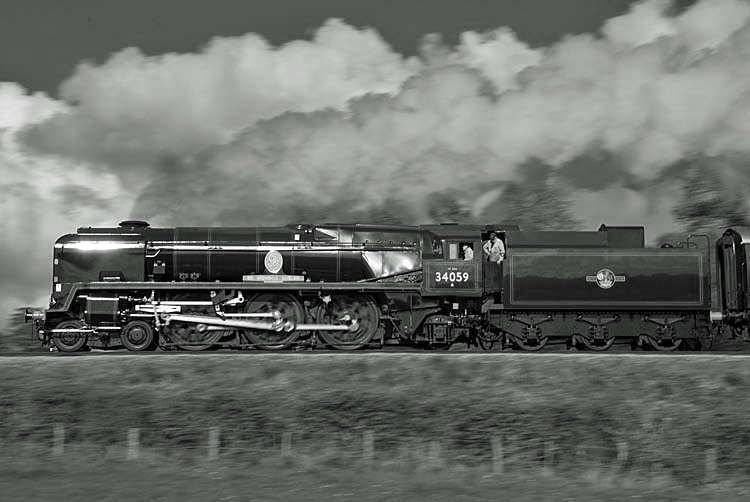 Photo of Bulleid Battle of Britain Class pacific number 34059, Sir Archibald Sinclair, climbing up into Horsted Keynes with a train from Sheffield Park on 25th April 2009