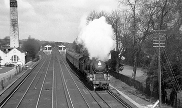 Photo of Bulleid Battle of Britain Class pacific number 34077, 603 Squadron, heading a Victoria to Dover or Folkestone  boat train through Shortlands, near Bromley South, in the first half of 1961