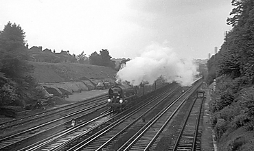 Photo of Bulleid West Country Class pacific number 34100, Appledore, heading the last steam locomotive hauled down Golden Arrow pullman train through Bromley South on 11th June 1961