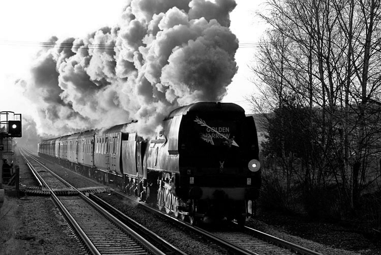 Photo of Bulleid battle of Britain Class pacific number 34067, Tangmere, heading a special train from London-Folkestone Harbour-London through Sturry, near Canterbury, on 24th January 2009