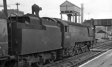 Photo of original Bulleid West Country  Class pacific number 34099, Lynmouth, at Southampton Central whilst heading a Bournemouth to London, Waterloo train in the mid 1960s