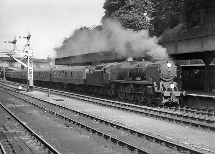 Photo of a Bulleid West Country Class pacific at Exeter Central on a down  train from  London, Waterloo, in early September 1962