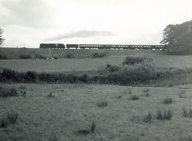 Photo of a Bulleid West Country Class pacific climbing Upwey bank from Weymouth with a train form Weymouth to London, Waterloo in the mid 1960s