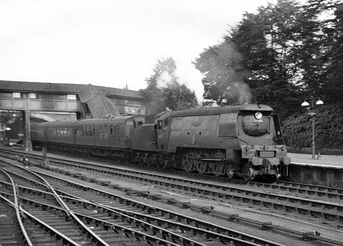 Photo of original Bulleid Battle of Britain Class pacific number 34076, 41 Squadron, at Exeter Central with a train for Ilfracombe in early September 1962