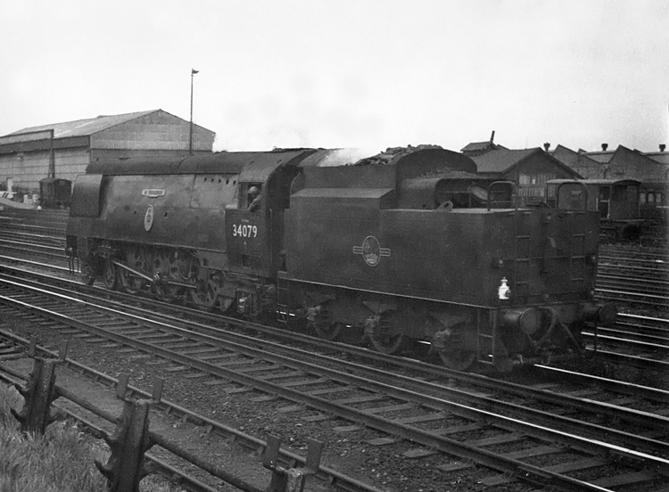 Photo of original Bulleid Battle of Britain Class pacific number 34079, 141 Squadron, running towards London at Wimbledon in the mid 1960s