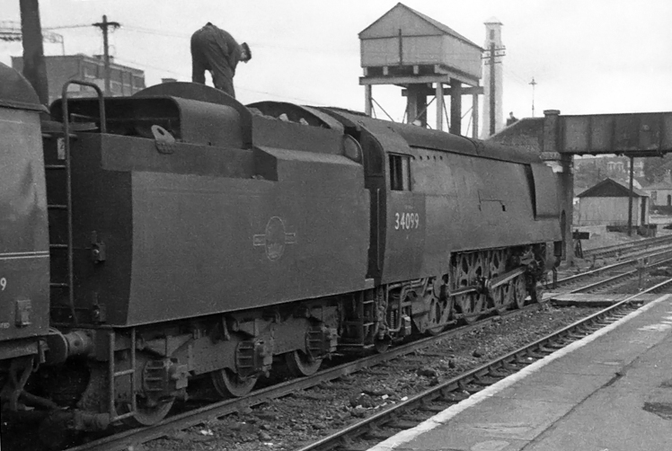 Photo of an original Bulleid West Country  Class pacific number 34099, Lynmouth, at Southampton Central whilst heading a Bournemouth to London, Waterloo train in the mid 1960s