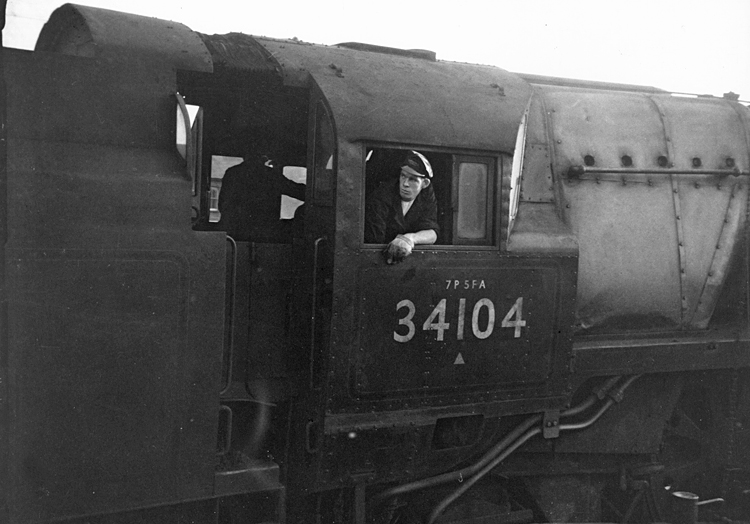 Photo of Bulleid West Country  Class pacific number 34104, Bere Alston on a London, Waterloo to Salisbury train at Basingstoke in the mid 1960s