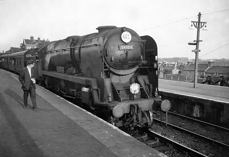 Photo of Bulleid West Country  Class pacific number 34104, Bere Alston on a London, Waterloo to Salisbury train at Basingstoke in the mid 1960s