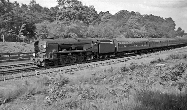 Photo of Bulleid Merchant Navy  Class pacific number 35005, Canadian Pacific, on the slow line between Pirbight Junction and Milepost 31when heading a London, Waterloo to Bournemouth train in the mid 1960s