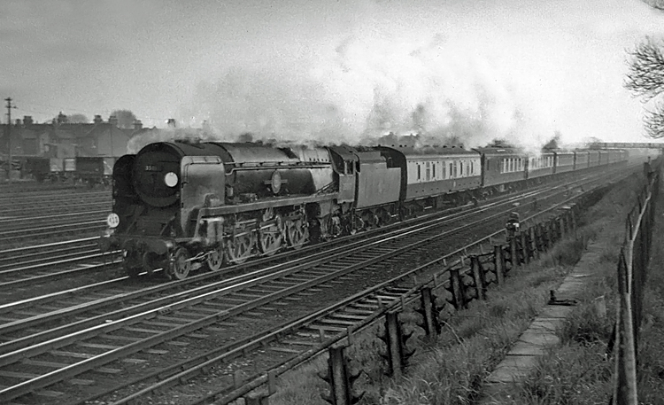 Photo of Bulleid Bulleid Merchant Navy Class pacific number 35012, United States Lines, heading towards Wimbledon with the 16.28 Bournemouth West to Waterloo, the up Bournemouth Belle pullman car train on 4th April 1965