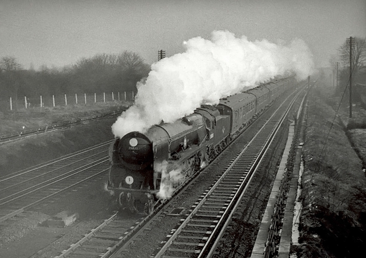 Photo of Bulleid Merchant Navy  Class pacific number 35030, Elder Dempster Lines between Raynes Park and New Malden at the head of a London, Waterloo to West of England train in the mid 1960s