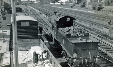 Photo of C2X Class 0-6-0 loco 32549 shunting the small yard at Wimbledon in 1962