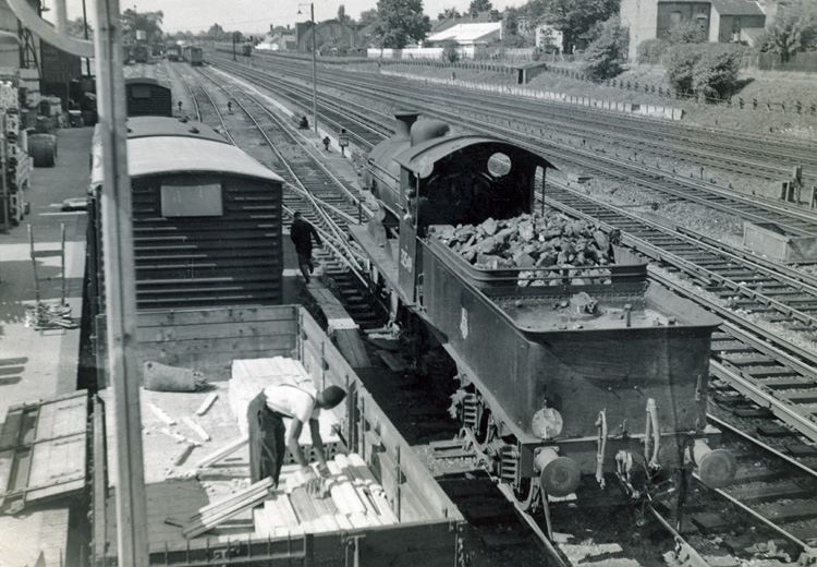 Photo of C2X Class 0-6-0 loco 32549 shunting the small yard at Wimbledon in 1962