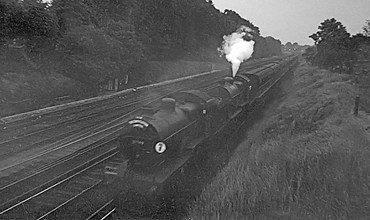 Photo of D1 4-4-0 31749 and L1 4-4-0 31786 doublehead a special train down from Bickley towards Bromley South at 20.45 on the evening of a very dull June 11th 1961