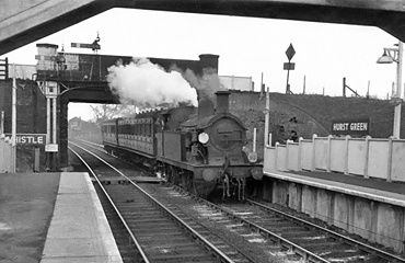Photo of H class 0-4-4 tank loco number 31522 entering Hurst Green station with a train from Tunbridge Wells West to Oxted, circa April 1962