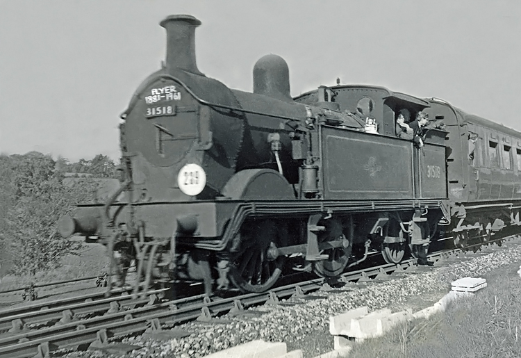 Photo of H class 0-4-4 tank loco number 31518 on a Westerham Branch line train at Dunton Green on 28th October 1961, the last day of operation of the branch line to Westerham