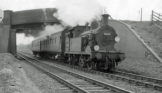 Photo of H class 0-4-4 tank loco number 31324 near Edenbridge with a Tunbridge Wells West-Oxted line train on 19th April 1962