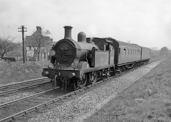 Photo of H class 0-4-4 tank loco number 31278 entering Hurst Green with a Tunbridge Wells West to Oxted train on 26th April 1962
