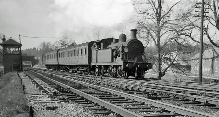 Photo of H class 0-4-4 tank loco number  leaving Hurst Green with an Oxted to Tunbridge Wells West train on 26th April 1962