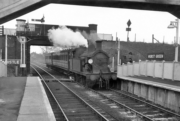 Photo of H class 0-4-4 tank loco number 31522 arriving at Hurst Green in a Tunbridge Wells West to Oxted train in 1962