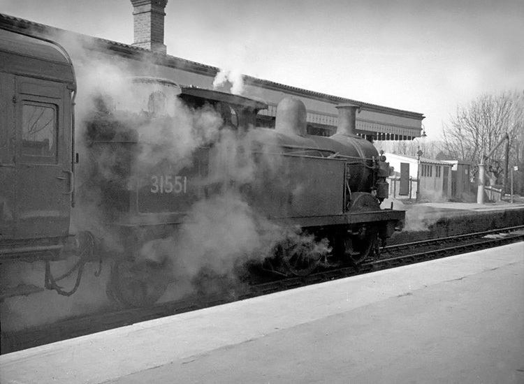 Photo of H class 0-4-4 tank loco number 31551at an unidentified location, (possibly Edenbridge Town),   on the Oxted line system in 1962
