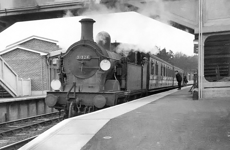 Photo of H class 0-4-4 tank loco number 31324 at Hurst Green with a down train to Tunbridge Wells in 1962