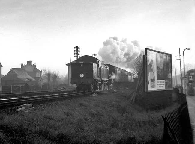 Photo of H16 Class 4-6-2  tank loco 30517 between Chessington South and Wimbledon in December 1962