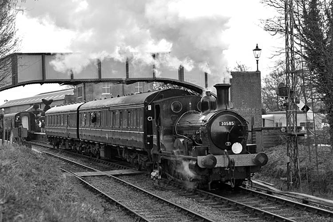 Photo of 0298 Class 2-4-0 well tank leaving Ropley on the Mid Hants Railway on March 13th 2009