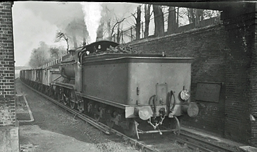 Photo of a K class 2-6-0 hauling a coal train at South Croydon, circa 1961/62