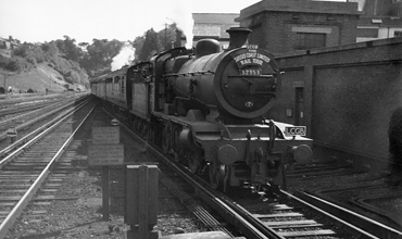 Photo of K Class 2-6-0 loco 32353 entering Haywards Heath with railtour on 24th June 1962