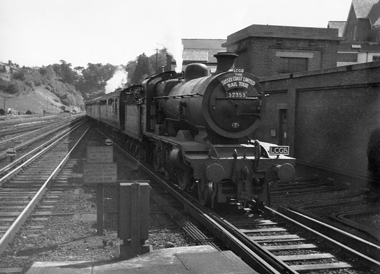 Photo of K Class 2-6-0 loco 32353 entering Haywards Heath with railtour on 24th June 1962