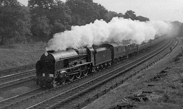 September 1962 photo of Lord Nelson Class 30861 on railtour between Pirbight Junction and Milepost 31