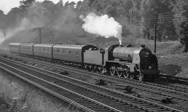 Photo of Maunsell S15 class 4-6-0 number 30844 on an up local train from Salisbury to Waterloo, due 17.36,  between Milepost 31 and Pirbight Junction on 25th August 1962