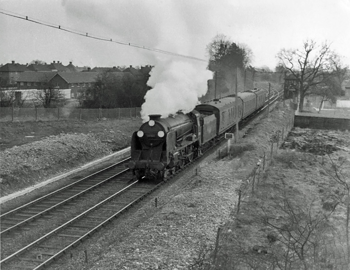Photo of Schools Class 4-4-0 30901 on the 07.17 Brighton to London Bridge at Hurst Green Junction in  April 1962