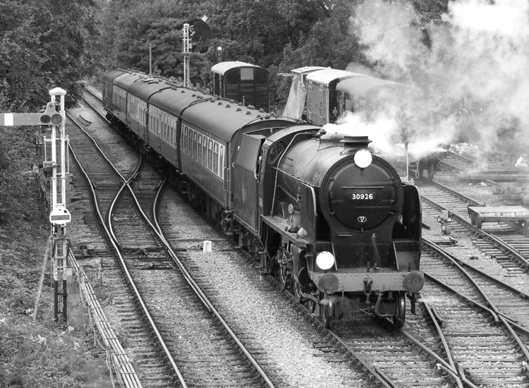 Photo of Schools Class 4-4-0 30926 on a Mid Hants Railway train approaching Medstead and Four Marks from Ropley on September 21st 2007
