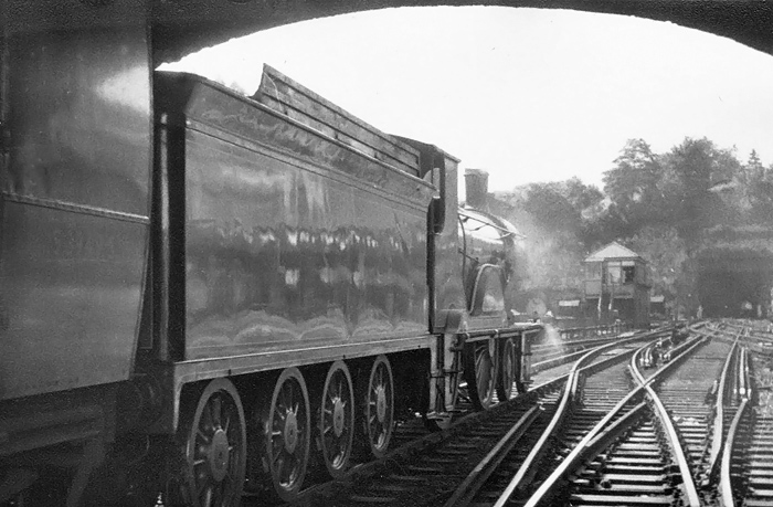 Photo of T9 class 4-4-0 number 30120 leaving Guildford  on the Sussex Coast Limited Railtour on 24th June 1962